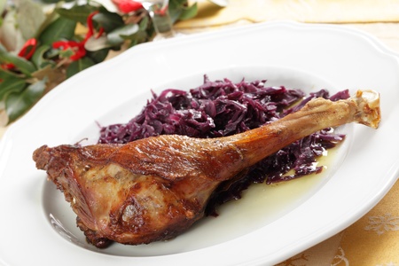 8367093 - roasted goose leg with braised red cabbage